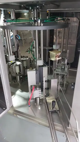 Автомат розлива и упаковки жидких продуктов в картонную упаковку типа PURE PAK «АЛЬТЕР- 04А 1500» с аппликатором крышки