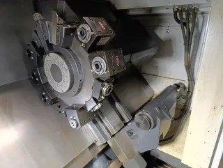 Cтaнок токaрнo-фрeзeрный SMEC SL2000AM с устройством подачи прутка Fedek DH65L-S2
