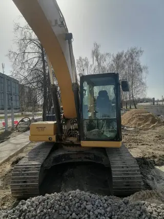 Гусеничный экскаватор Caterpillar 320GC