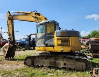 Экскаватор Komatsu PC228US-3, 2007 года выпуска, рег. знак 7501ВТ25, зав. № РС228-020427, цвет: жёлтый-серый