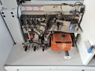 Кромкооблицовочный станок с прифуговкой WoodTec