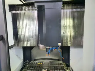 Вертикально-фрезерный обрабатывающий центр Doosan NX6500 II