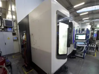 Токарно-фрезерный центр с ЧПУ DMG MORI NTX 2000/1500 SZM