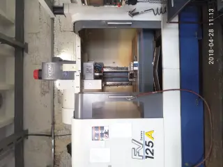 Вертикальный обрабатывающий центр с ЧПУ YCM FV 125 A