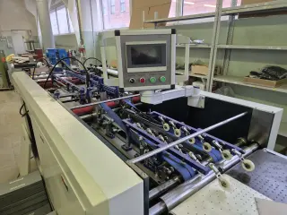 Станок для загибки клапанов переплетной крышки