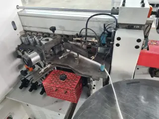 Кромкооблицовочный станок бу KDT