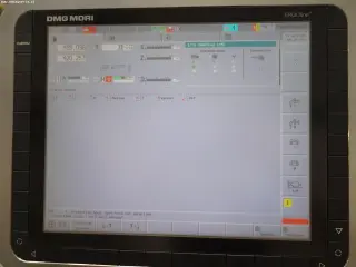 Токарный центр с ЧПУ DMG MORI NEF 400