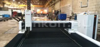 Оптоволоконный лазер для резки металла со сменным столом XTC-1560E/6000 Raycus