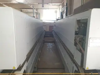 Кромкооблицовочный станок двусторонний Homag
