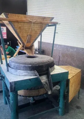 Мельница для муки и урбеча с каменными жерновами