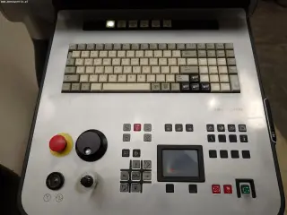 Токарный центр с ЧПУ DMG MORI NEF 400