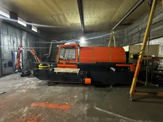 миниземснаряд экскаватор