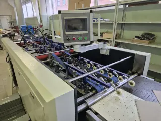 Станок для загибки клапанов переплетной крышки