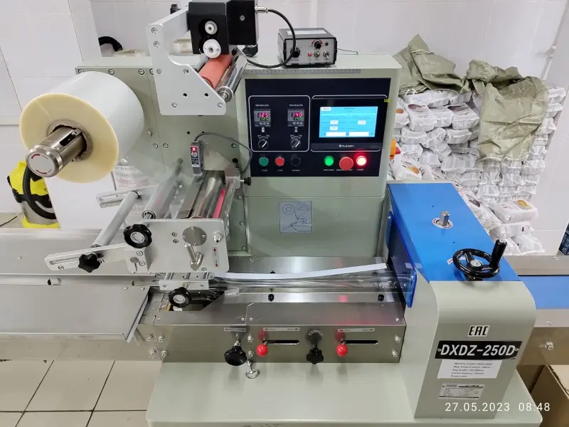 Горизонтальная упаковочная машина Hualian dxdz-250D