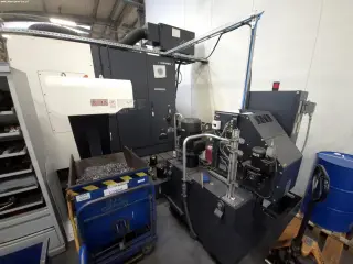 Токарно-фрезерный центр с ЧПУ DMG MORI NTX 2000/1500 SZM