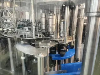 Комплектная линия розлива газ. и негаз. воды 6000 бут/час в ПЭТ 1,5л, 8000 бут/час 075л