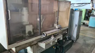 ВЗ-205Ф3 - Полуавтомат заточный для задних и передних поверхностей винтовых зубьев концевых фрез. С ЧПУ
