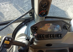 Экскаватор-погрузчик New Holland B100D