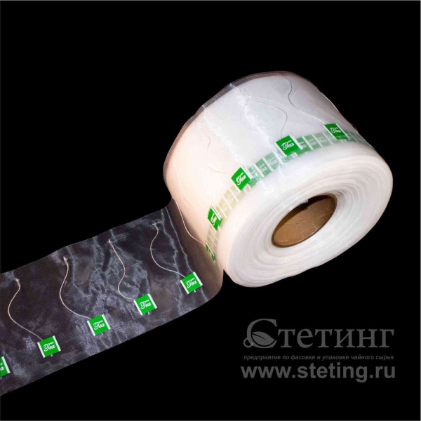 Рулон нейлоновой ленты с нитью и ярлыком