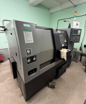 Токарный станок с ЧПУ DMC DL 6TM+автомат подачи прутка (барфидер) DH65LS 1.5 mm