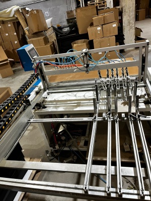 Машина производства крышек