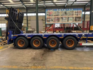 Полуприцеп-трал с трапами TONGYADA CTY9804TDPS 4-оси, грузоподъёмностью 65 тонн, новый