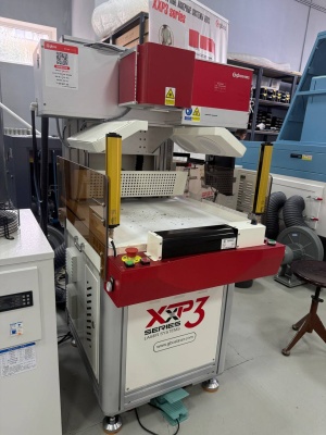 Лазерный станок XXP3 для резки, маркировки и перфорации текстиля и кожи