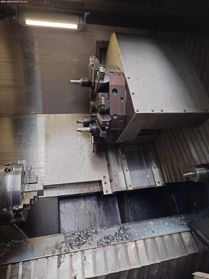 Токарный центр с ЧПУ DMG MORI NEF 400