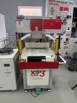 Лазерный станок XXP3 для резки, маркировки и перфорации текстиля и кожи