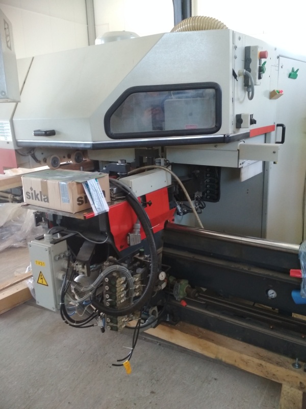 Угловой обрабатывающий центр для производства деревянных окон Weining, тип Unicontrol-10