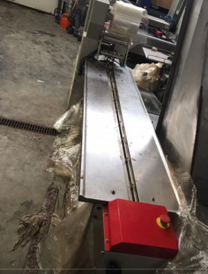 Горизонтальный упаковщик Hualian DXDZ-250B