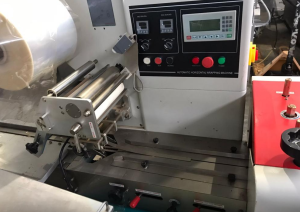 Горизонтальный упаковщик Hualian DXDZ-250B