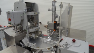 Машина для розлива и упаковки мини-порций сливочного масла Benhil 8304 - 8534