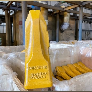 Зубья, адаптеры и коронки ковшей экскаваторов и погрузчиков