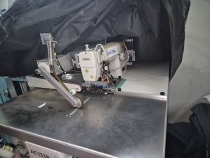 Швейная машина-робот Brother Industries для шитья переплетных крышек