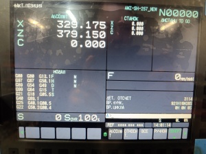 Cтaнок токaрнo-фрeзeрный SMEC SL2000AM с устройством подачи прутка Fedek DH65L-S2