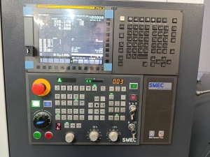 Cтaнок токaрнo-фрeзeрный SMEC SL2000AM с устройством подачи прутка Fedek DH65L-S2