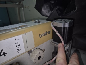 Швейная машина-робот Brother Industries для шитья переплетных крышек