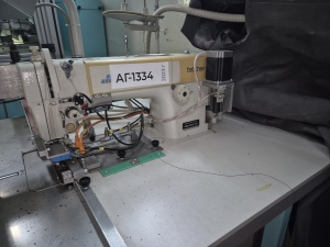 Швейная машина-робот Brother Industries для шитья переплетных крышек